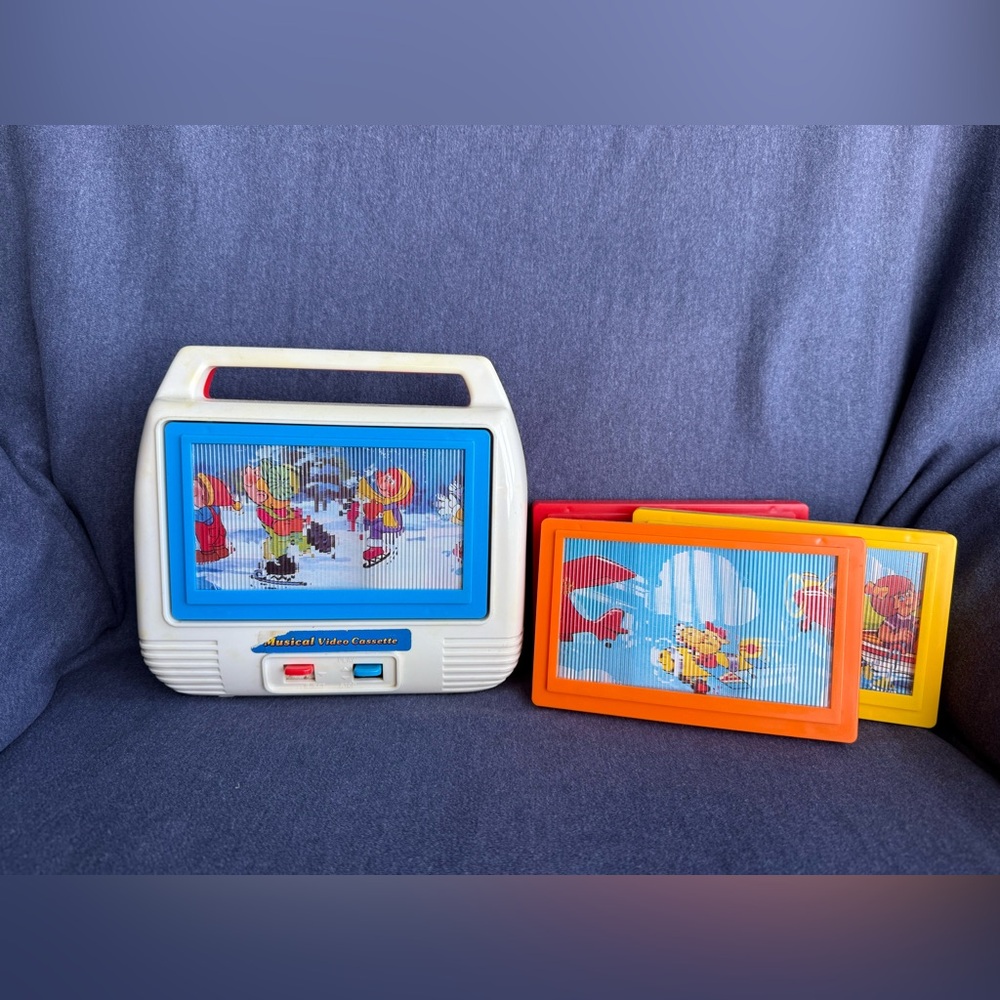 Vintage Musical Video Cassette Player with Colorful Slides